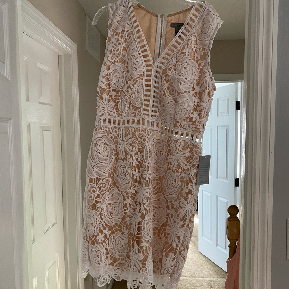 White lace dress perfect for wedding events